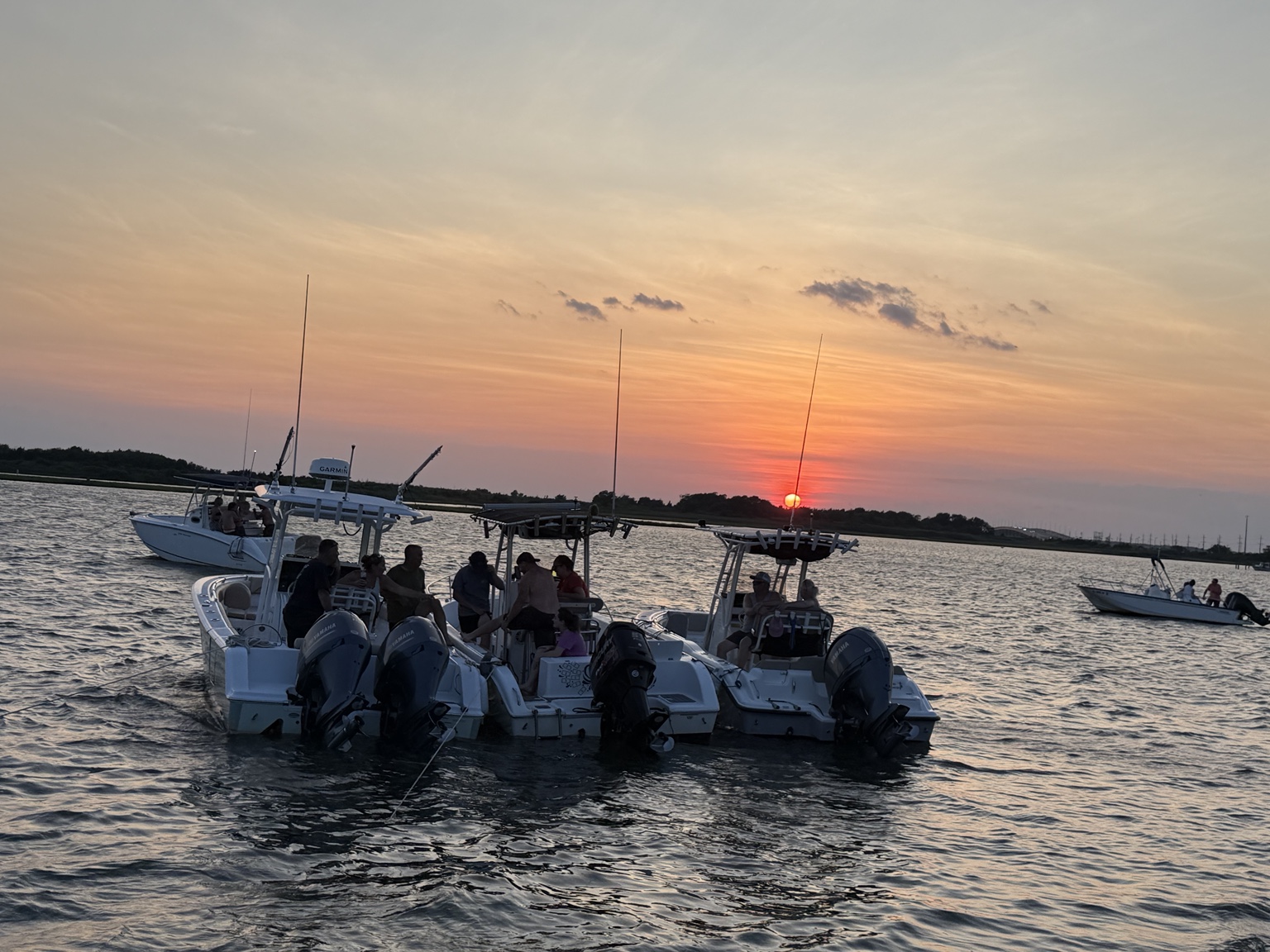 Boats gathered at sunset